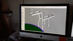 A rendering of a shipping container crane for a hole
